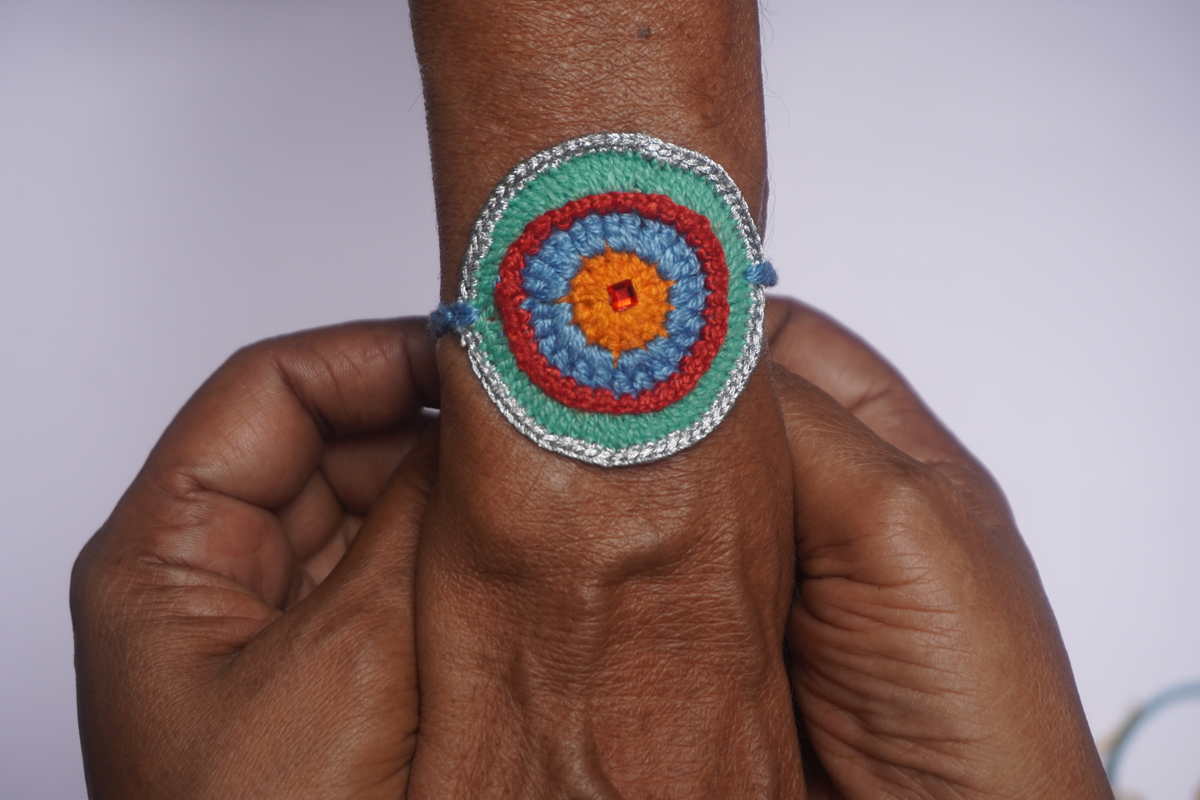 Set of two Unique Crochet Rakhi - Circle of Hope with Modern English Colors